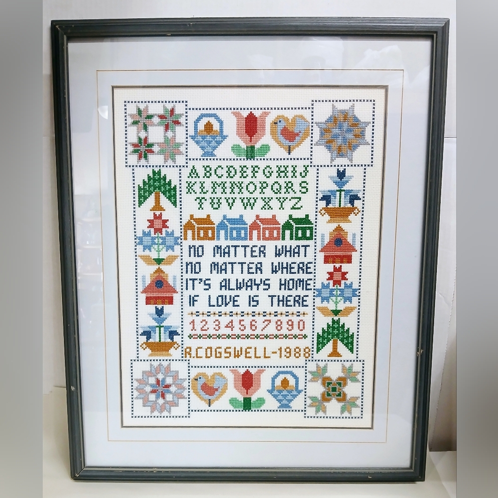 Vintage Framed Cross-Stitch Sampler with Colorful Patterns